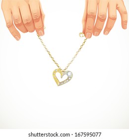 Male hands holding a gold chain bracelet with heart pendant, with jewels