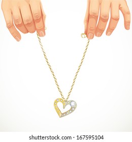 Male hands holding a gold chain with pendant-heart with gems