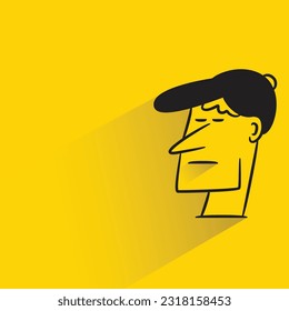 male head with shadow on yellow background