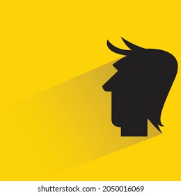 male head silhouette with shadown on yellow background