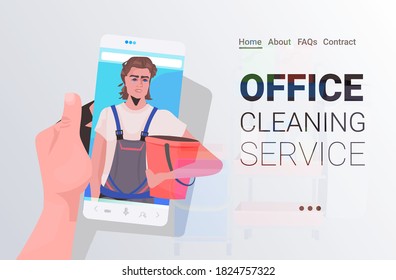 male janitor man cleaner on smartphone screen self isolation office cleaning service concept horizontal copy space portrait vector illustration