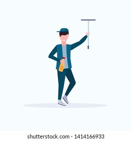 male janitor in uniform holding shower wiper squeegee and spray plastic bottle man cleaner wiping glass cleaning service concept full length flat white background