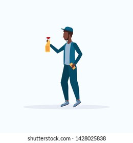 male janitor in uniform holding washcloth and spray plastic bottle african american man cleaner spraying cleaning service concept full length flat white background