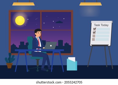 Male manager working overtime to finish task today while sitting in the office at night time