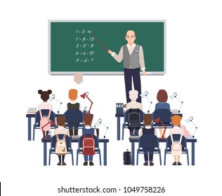 Male math teacher explaining addition to elementary school kids or pupils. Friendly man teaching mathematics or arithmetic to children sitting in classroom. Flat cartoon colorful vector illustration