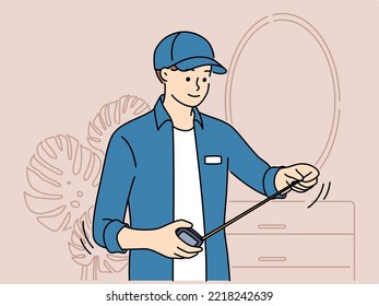 Male mechanic with measuring tape working in room in house. Smiling repairman with tape measure busy indoors. Vector illustration. 
