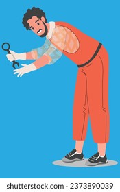 male mechanic with a tool and in overalls