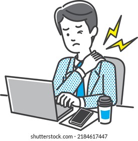 A male office worker who has stiff shoulders due to computer work