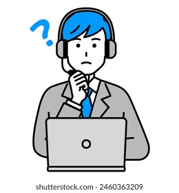 A male operator working on a thinking laptop