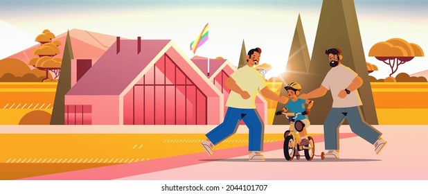 Male Parents Teaching Little Son To Ride Bike Gay Family Transgender Love LGBT Community Concept