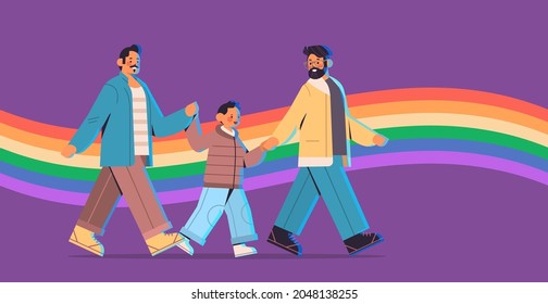male parents walking with little son gay family transgender love LGBT community concept
