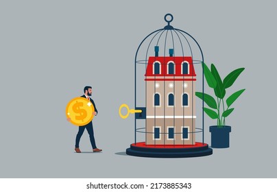 Male Pay Money To Unlock House From Cage. House Inside The Cage With Locked-Business And Financial Problems.