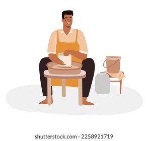 Male potter making a pot out of clay on a pottery wheel. Teacher at pottery class concept.