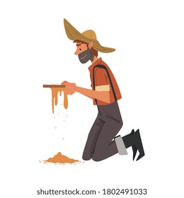 Male Prospector, Bearded Gold Miner Character Wearing Vintage Clothes and Hat Standing on his Knees and Panning Golden Sand and Pills Cartoon Style Vector Illustration