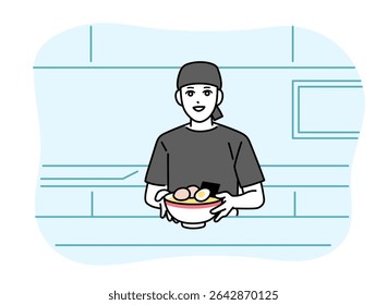 A male ramen shop attendant serving ramen