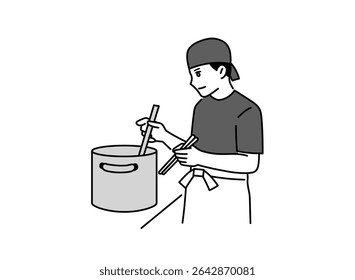 A male ramen shop employee mixing the soup in a stockpot