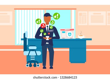 male security guard worker using mobile application social media concept man in uniform holding smartphone modern office interior full length flat horizontal copy space