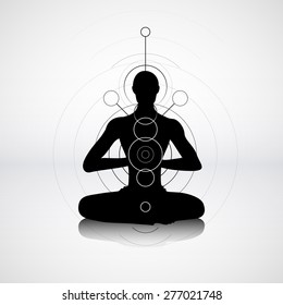 Male silhouette in yoga pose with abstract chakra symbols