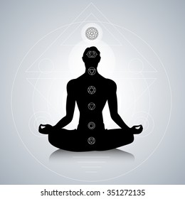 Male silhouette in yoga pose with abstract chakra symbols