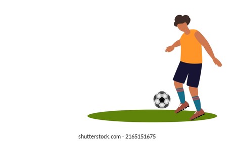 Male Soccer Player Kicking Football On Green Grass Patch