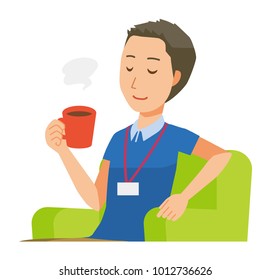A male staff wearing nameplate is sitting on the sofa and drinking coffee - upper body