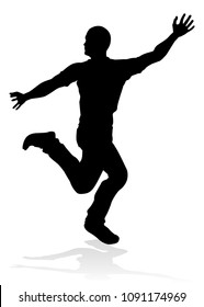 A male street dance hip hop dancer in silhouette