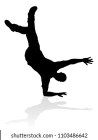 A male street dance hip hop dancer in silhouette