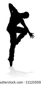 A male street dance hip hop dancer in silhouette