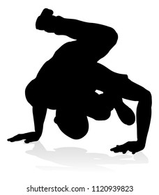 A male street dance hip hop dancer in silhouette