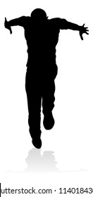A male street dance hip hop dancer in silhouette