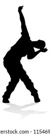 A male street dance hip hop dancer in silhouette