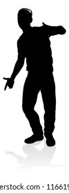 A male street dance hip hop dancer in silhouette