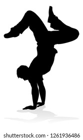 A male street dance hip hop dancer in silhouette