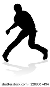 A male street dance hip hop dancer in silhouette