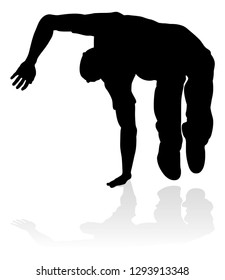 A male street dance hip hop dancer in silhouette