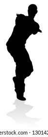A male street dance hip hop dancer in silhouette