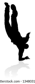 A male street dance hip hop dancer in silhouette
