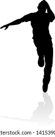 A male street dance hip hop dancer in silhouette