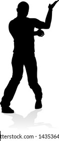 A male street dance hip hop dancer in silhouette