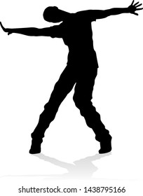 A male street dance hip hop dancer in silhouette