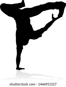 A male street dance hip hop dancer in silhouette