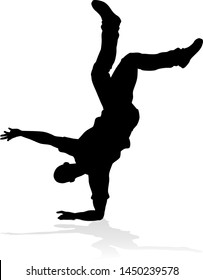 A male street dance hip hop dancer in silhouette