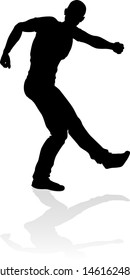 A male street dance hip hop dancer in silhouette