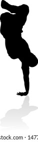 A male street dance hip hop dancer in silhouette