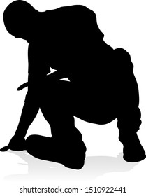 A male street dance hip hop dancer in silhouette
