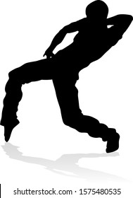 A male street dance hip hop dancer in silhouette