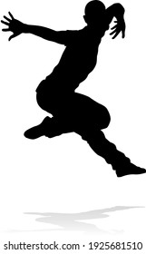 A male street dance hip hop dancer in silhouette