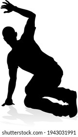 A male street dance hip hop dancer in silhouette
