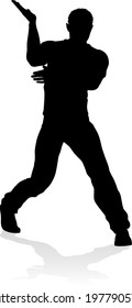 A male street dance hip hop dancer in silhouette