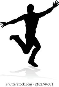 A male street dance hip hop dancer in silhouette